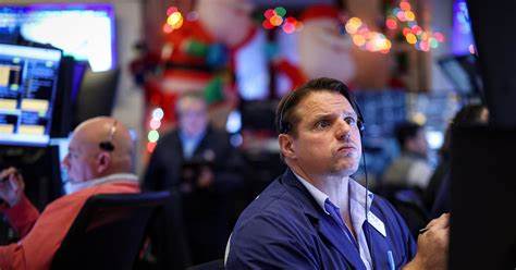 Stocks dive after Fed cuts rates, signals slower easing pace in 2025 - Reuters