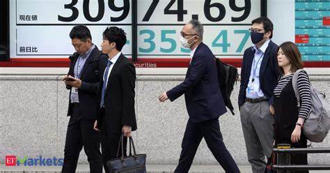 Asian stocks slide as China stimulus disappoints; bitcoin extends rally - Business Standard