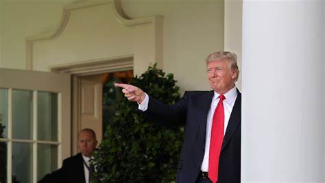 Trump signs executive order directing US withdrawal from the Paris climate agreement — again