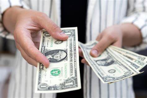 Dollar mostly flat as market mulls inflation outlook - Reuters