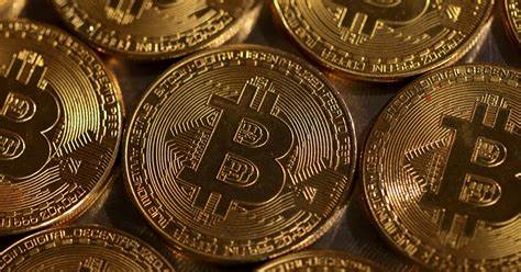 Bitcoin soars to record high, then tumbles - Reuters