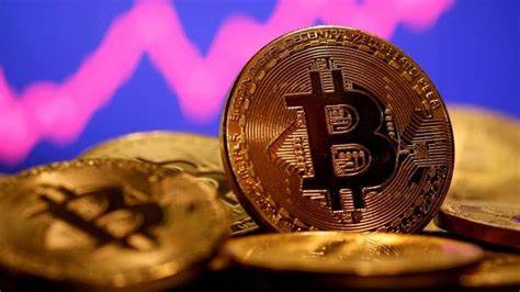 Bitcoin surges past $60,000 for first time - BBC.com