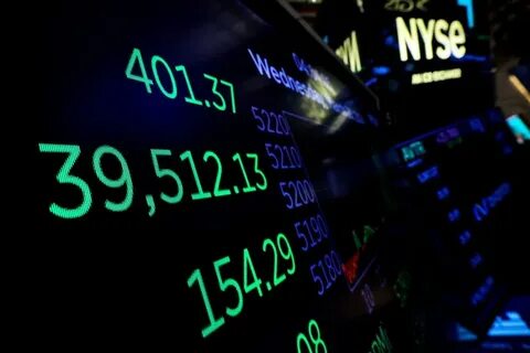 Wall St ends flat as investors await CPI, earnings - Reuters
