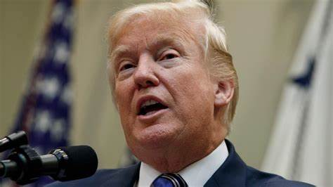 Trump signs military executive orders, sets stage for ban on transgender troops