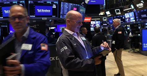 Wall Street closes up on tech boost; inflation data dents hopes for big Fed rate cut - Reuters