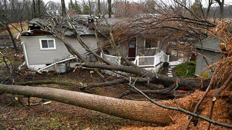 Deadly storms across the US deliver tornadoes, snow and flooding